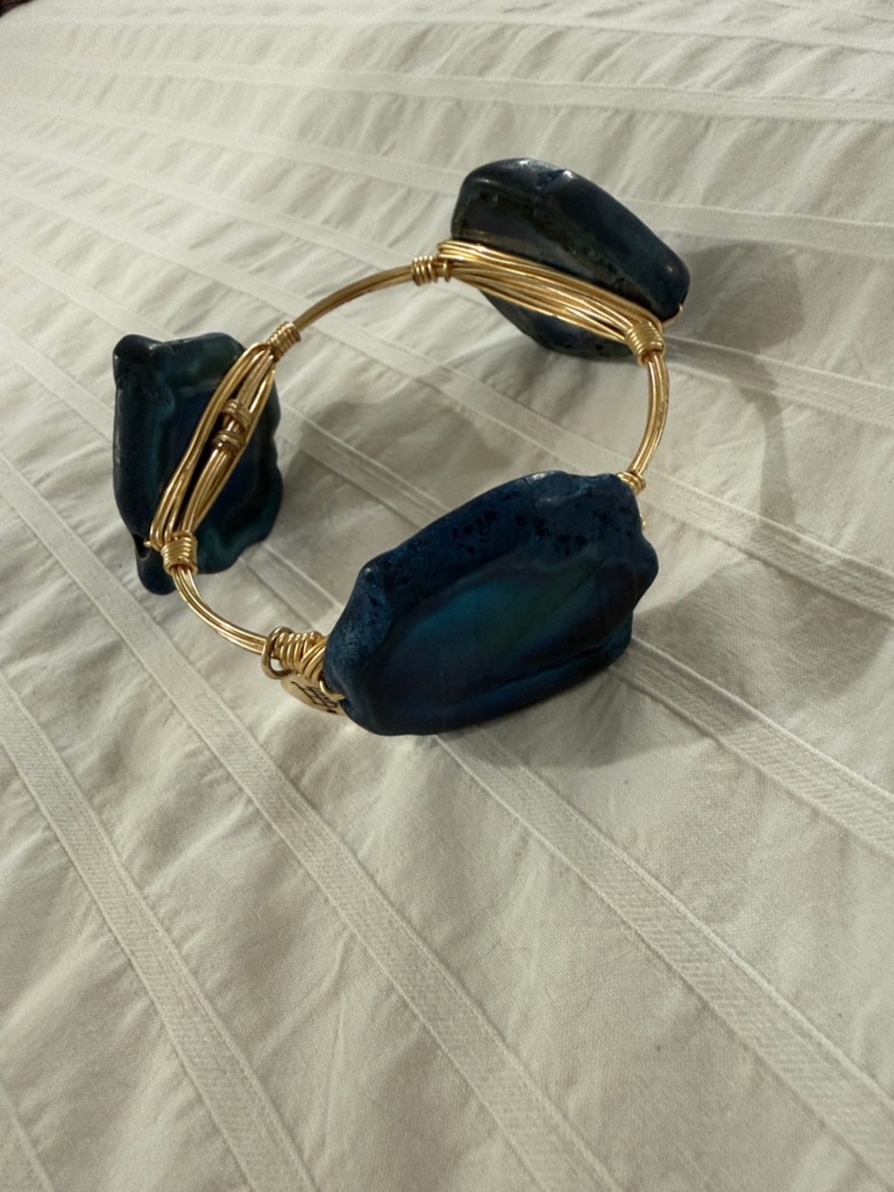 Bourbon and Bowties Gold Wire Bangle with Blue Agate Accent Stones